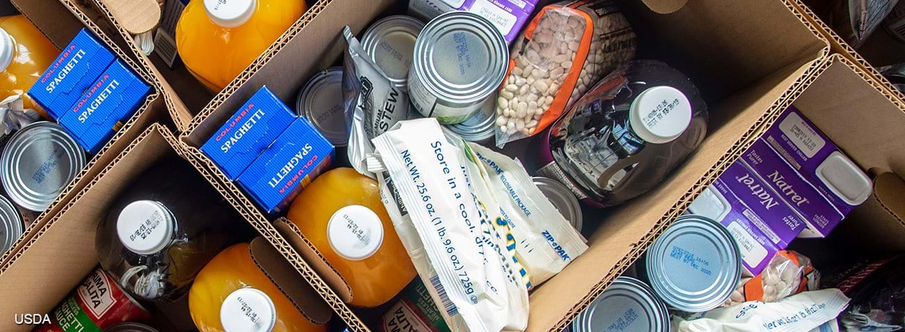 Boxes of food items at a food pantry