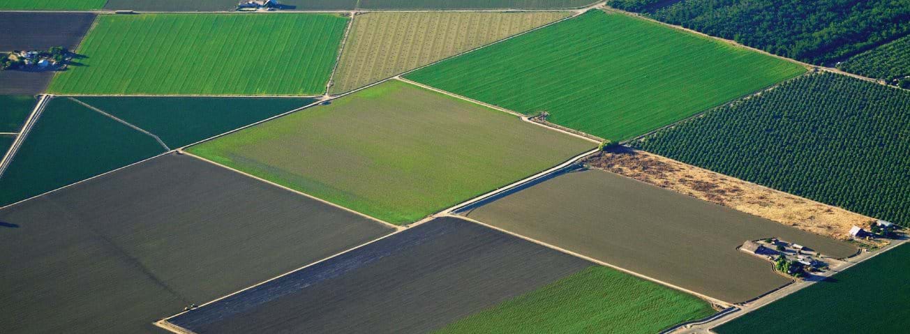 Aerial photo of squares of green farmland
