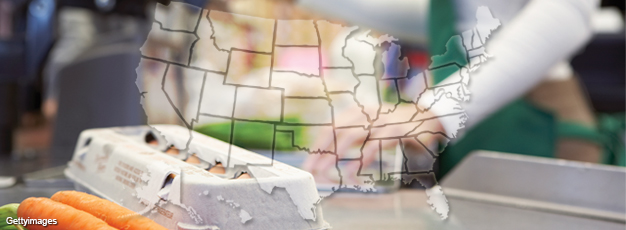 Photo of groceries on a checkout counter with a U.S. map overlay