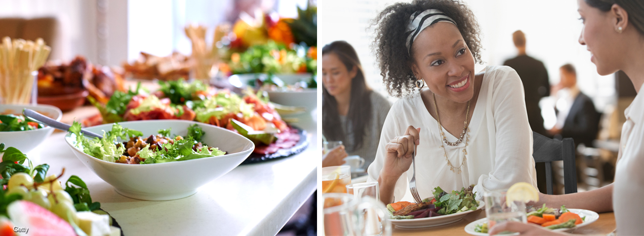 Food on dinner table and two women having lunch