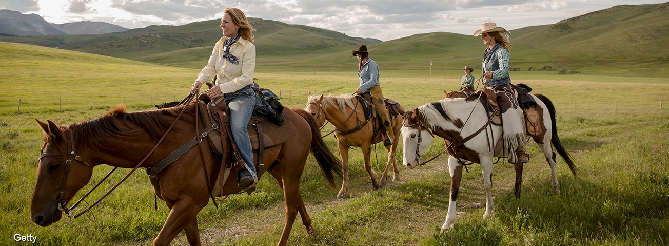 Women horseback riding