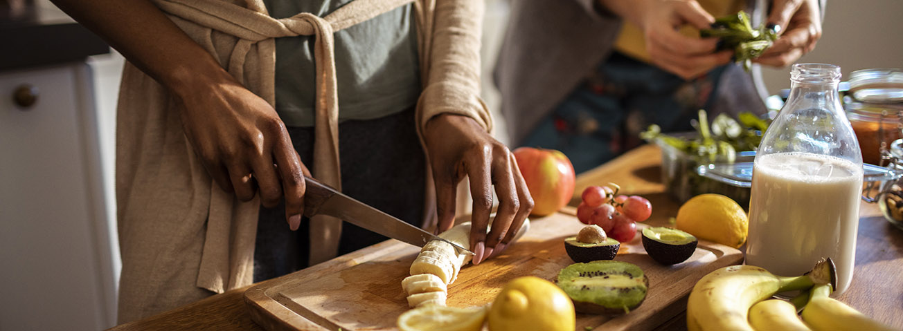 Hands preparing food