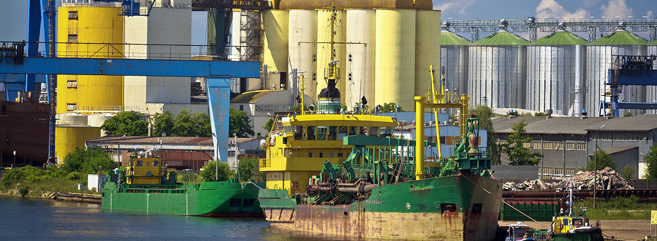 Boats near silos