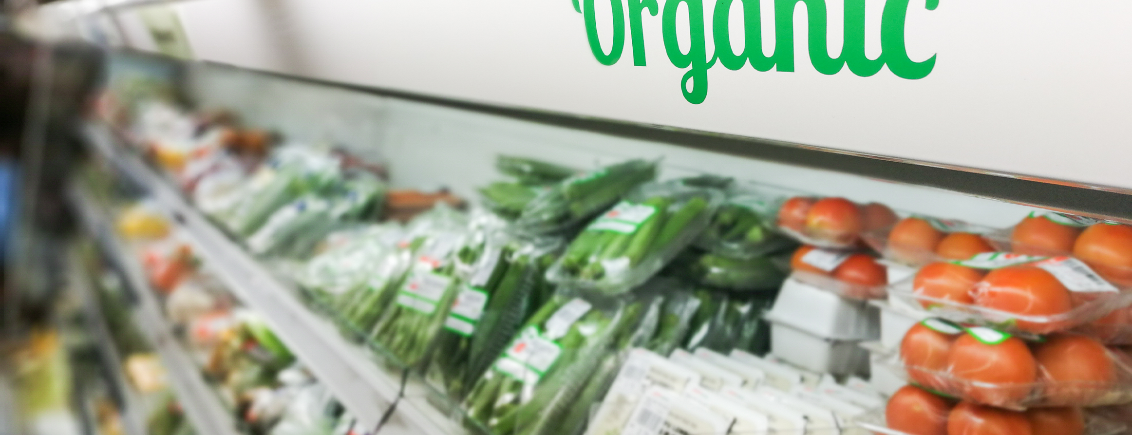 Photo of organic produce section at grocery store.