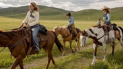 Women horseback riding