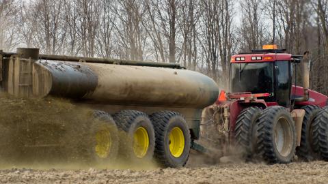 Trucking spraying fertilizer