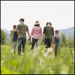 farm family walking in field